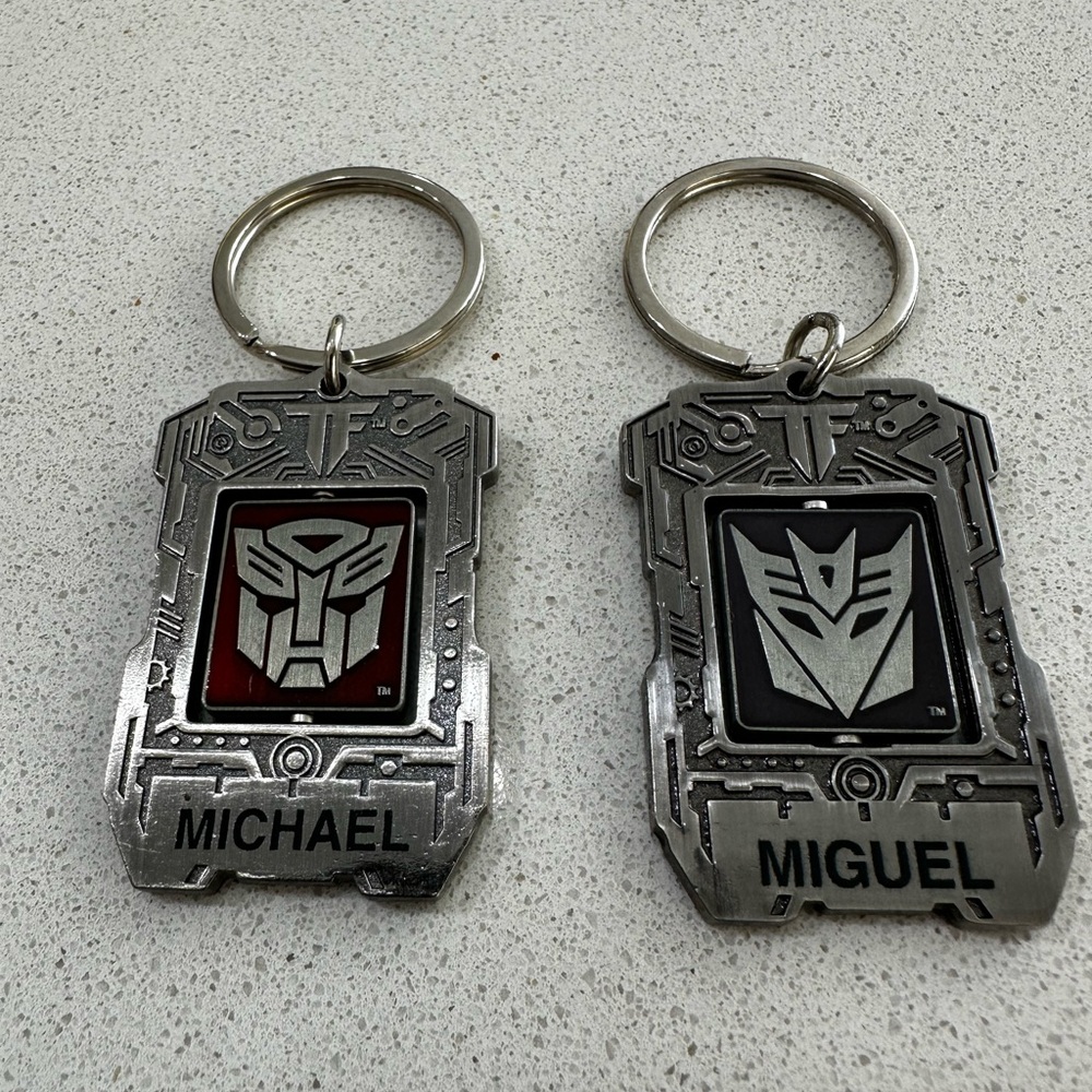 Transformer Universal Studios Metal Key Chain With Autobot Logo. Michael Miguel.